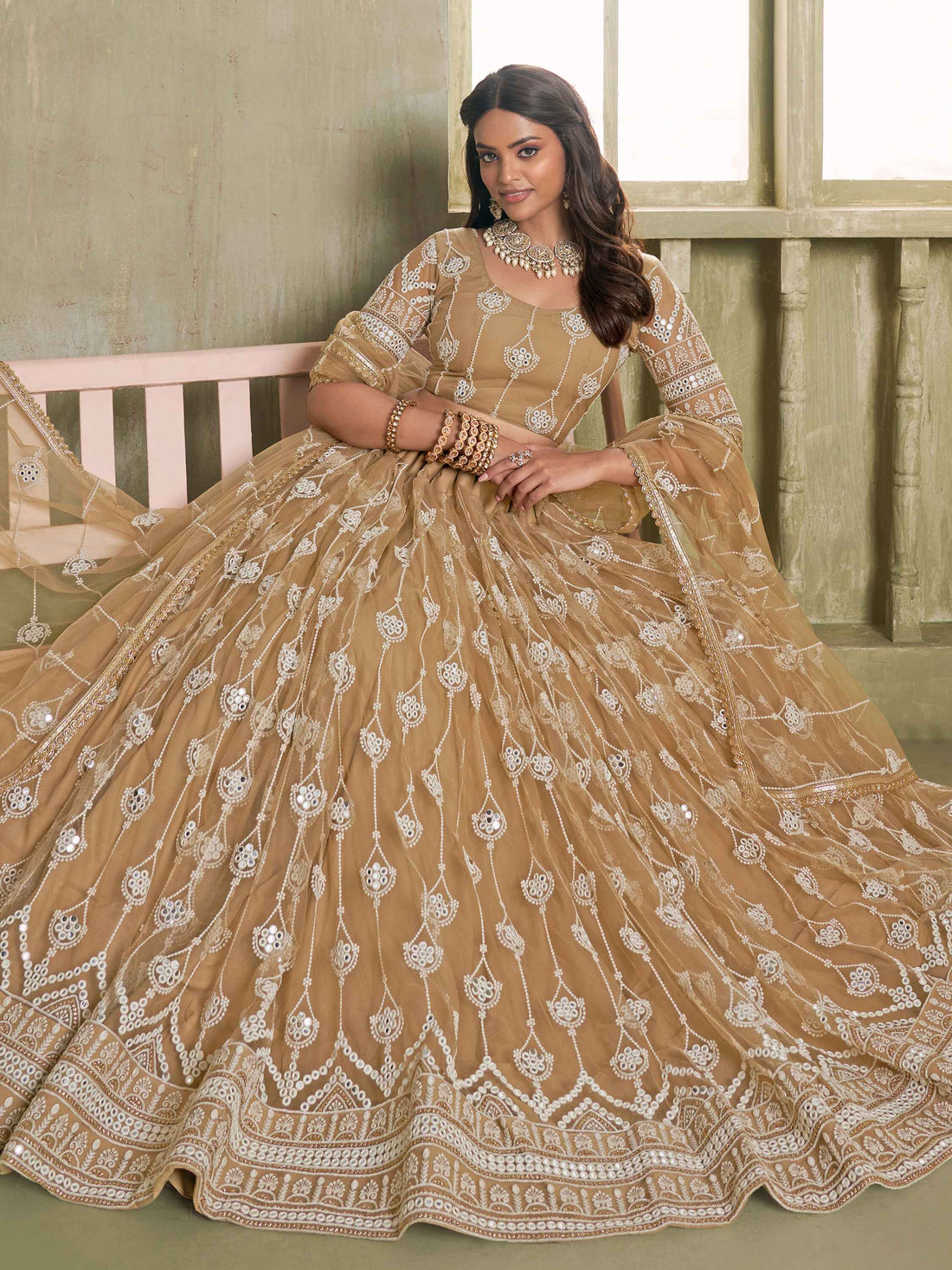 Dazzling Beige Sequins Net Engagement Wear Lehenga Choli