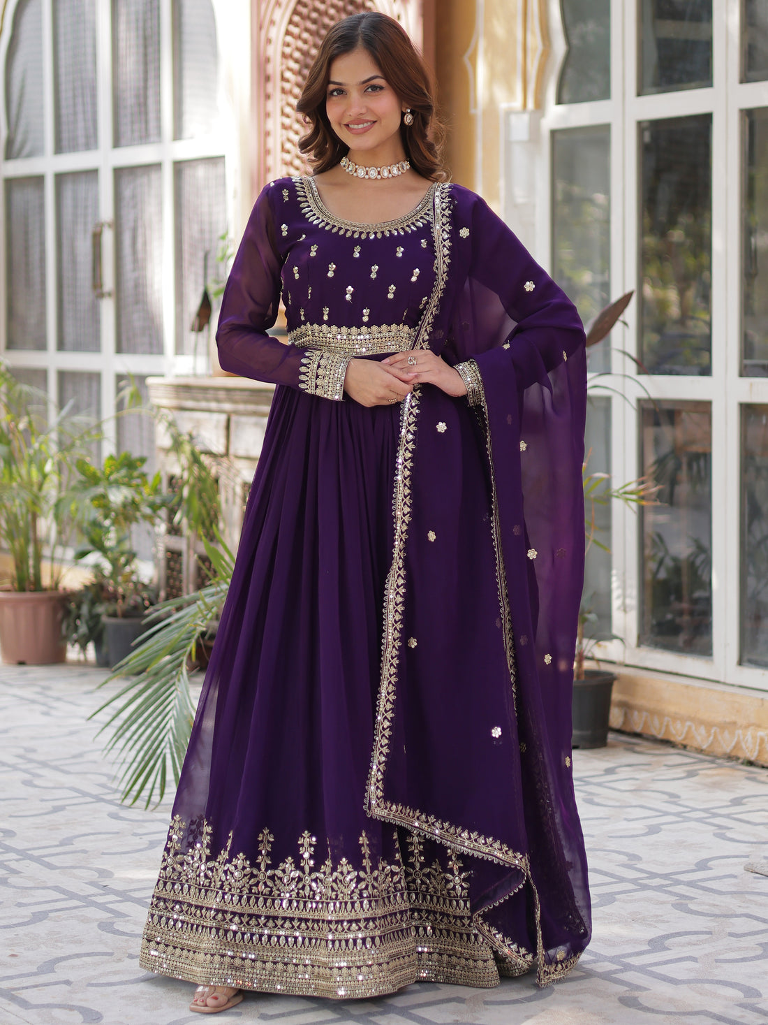 Adorable Purple Zari Embroidered Georgette Festive Wear Gown