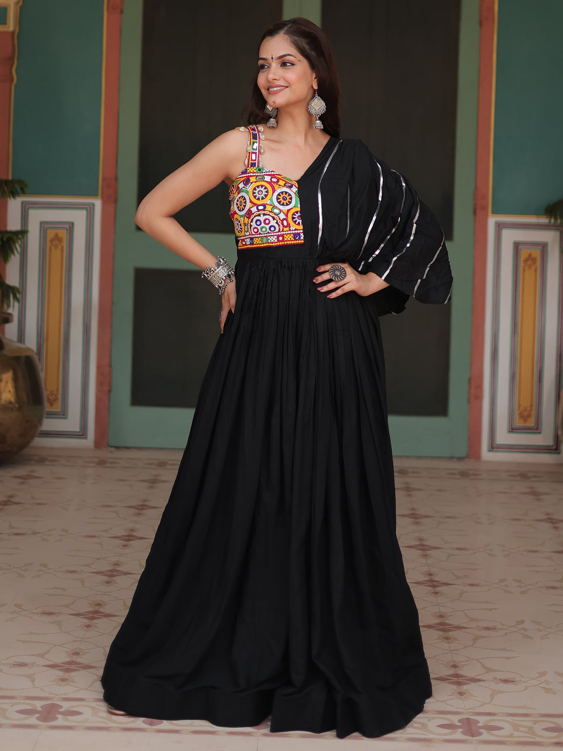 Fascinating Black Mirror Work Rayon Navratri Wear Gown