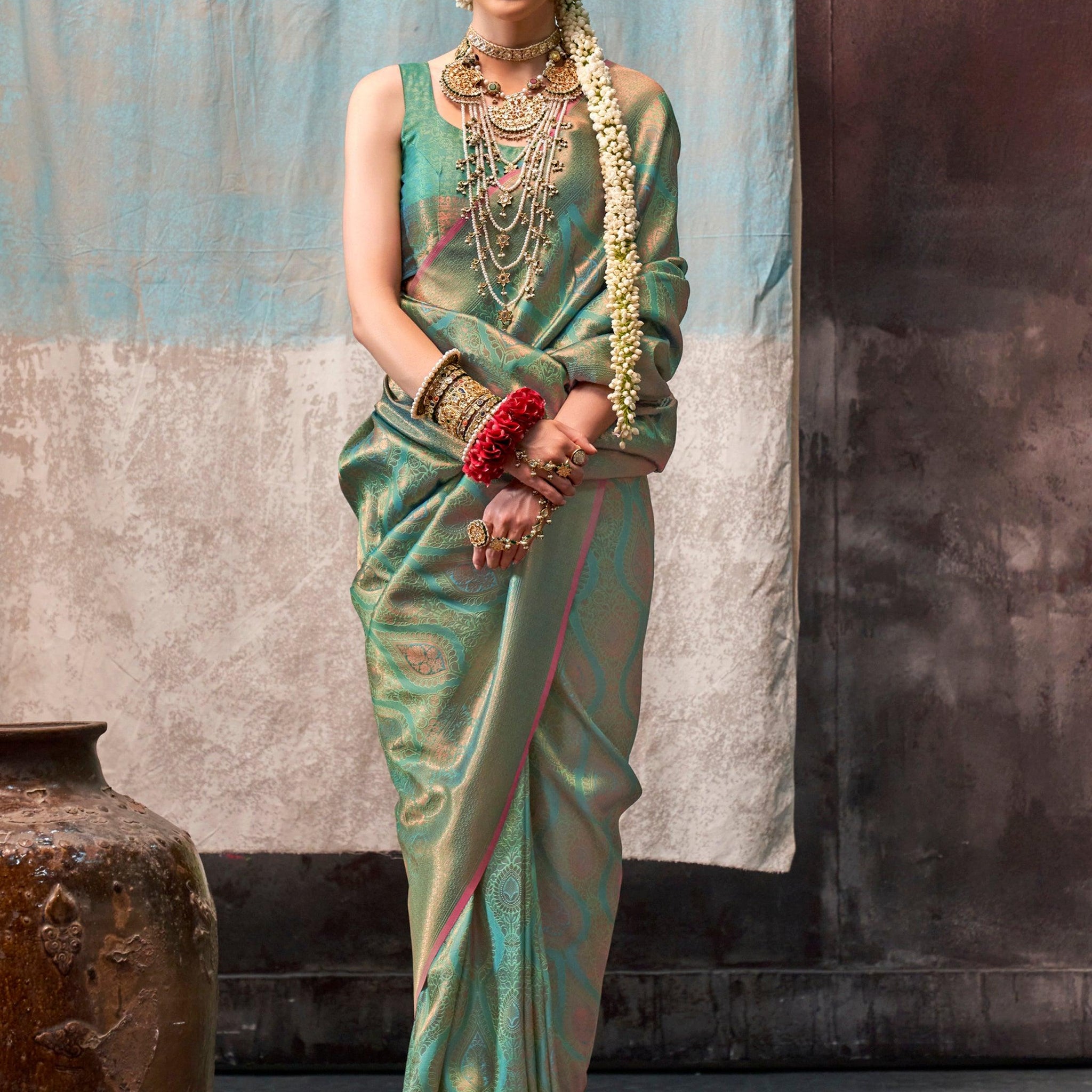 Captivating Green Zari Weaving Silk Traditional Saree With Blouse